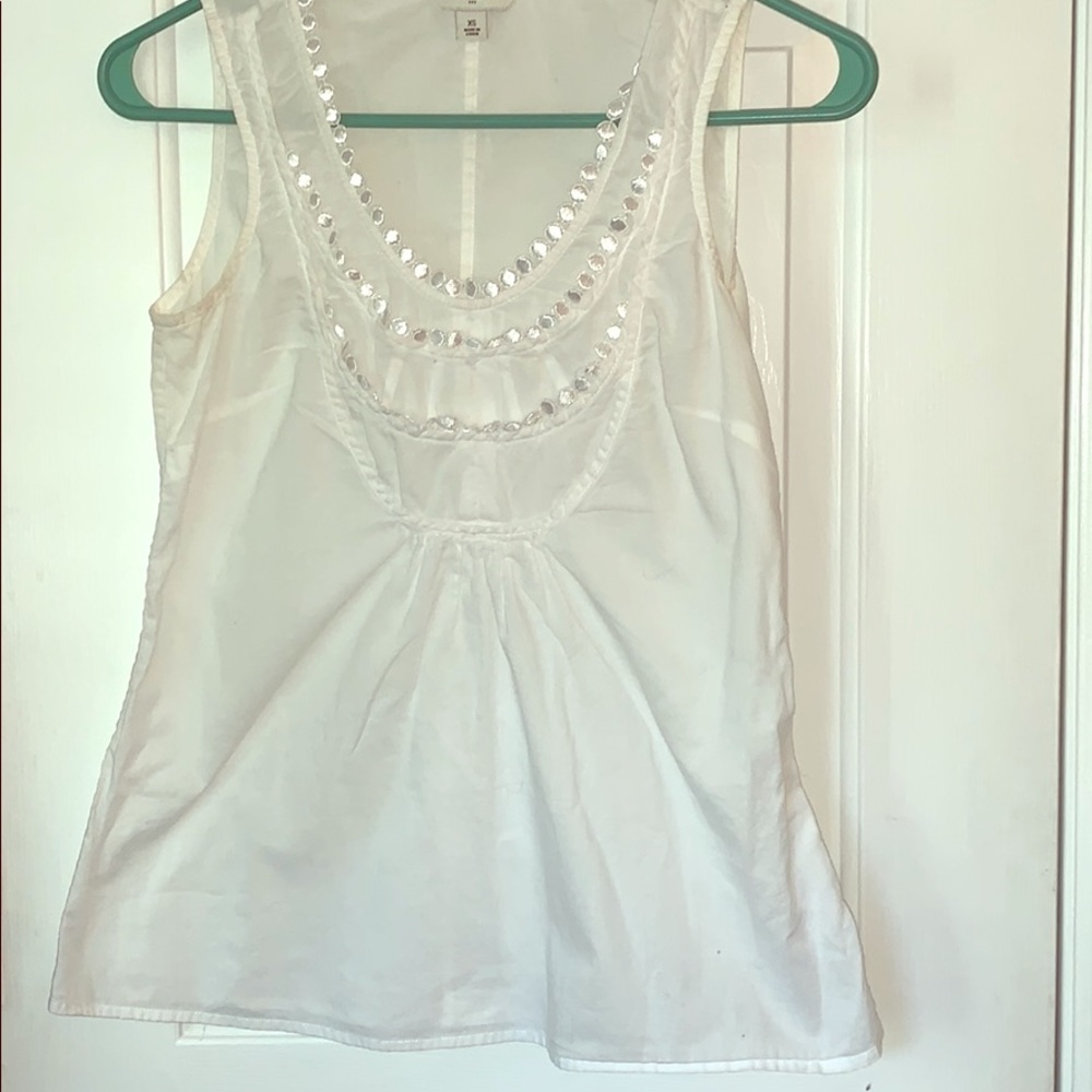 Sleeveless white top